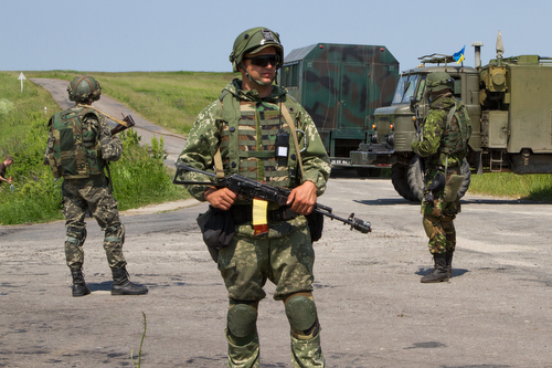 Soldiers from the Ukrainian National Guard's 3029th Regiment conduct checkpoint operations June 10, 2015, during a field exercise as part of Fearless Guardian in Yavoriv, Ukraine. Paratroopers from the U.S. Army's 173rd Airborne Brigade are in Ukraine for the first of several planned rotations to train Ukraine's newly formed national guard as part of Fearless Guardian, which is scheduled to last six months. (U.S. Army photo by Sgt. Alexander Skripnichuk, 13th Public Affairs Detachment)