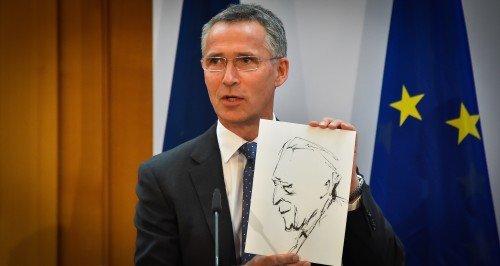 Speech by NATO Secretary General Jens Stoltenberg at the international ceremony to mark the 60th anniversary of the accession of Germany to NATO. The NATO Secretary General shows a sketch of Konrad Adenauer by the American artist, Manuel Bromberg